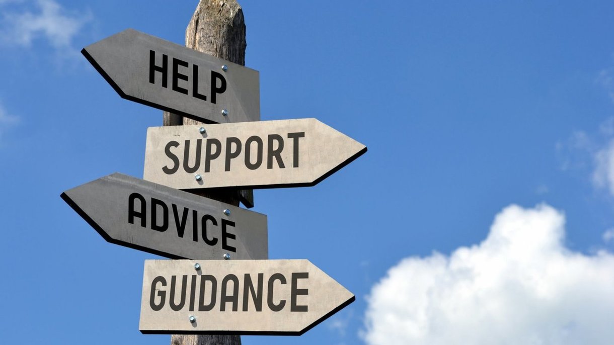 Help, Support, Advice, Guidance signs on pole